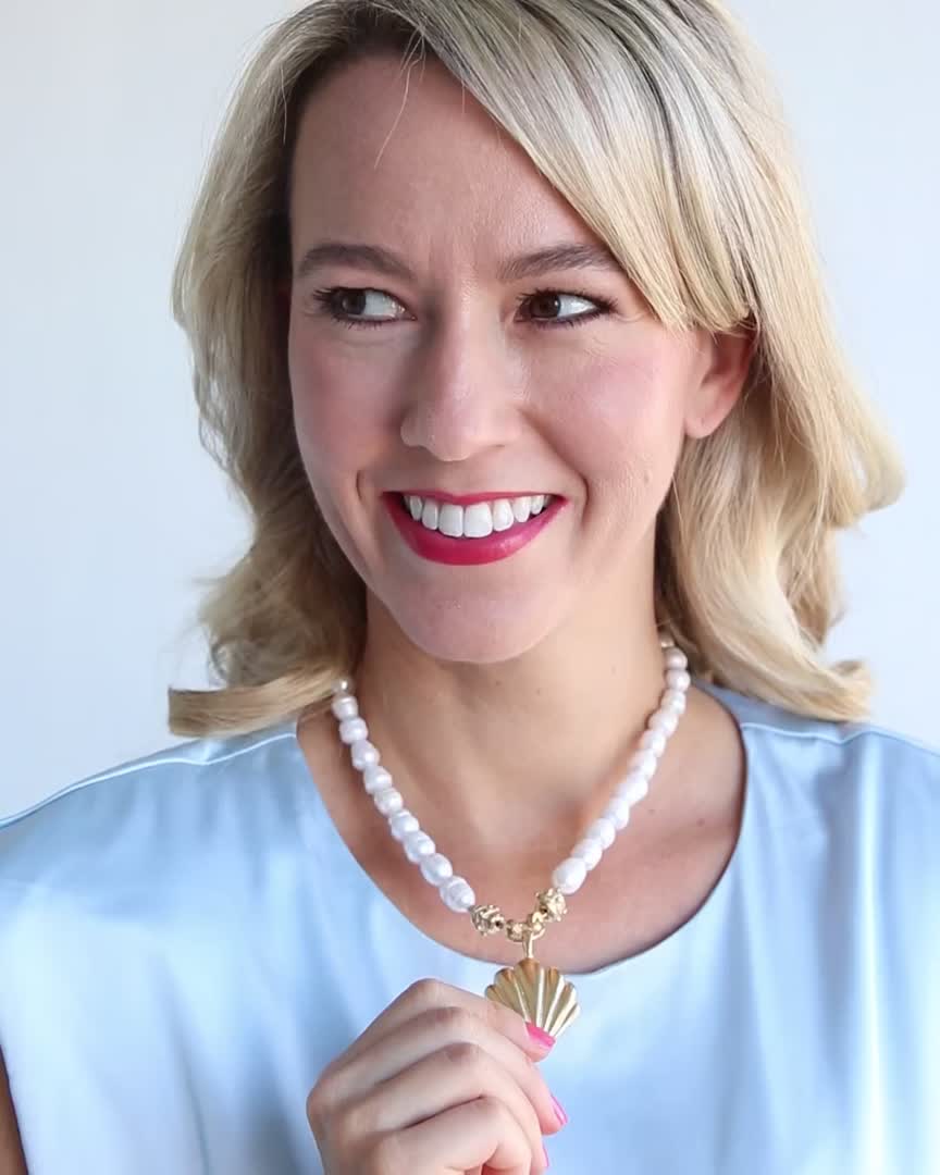 Our Marbella Pearl Necklace is the epitome of classy and timeless style. Connected to the pendant by our signature Bentley Beads, freshwater pearls give this piece an heirloom feel. Wear it as an accessory to your beachside ensemble with our Marbella Studs or as the perfect piece to complement your happy hour mini dress.