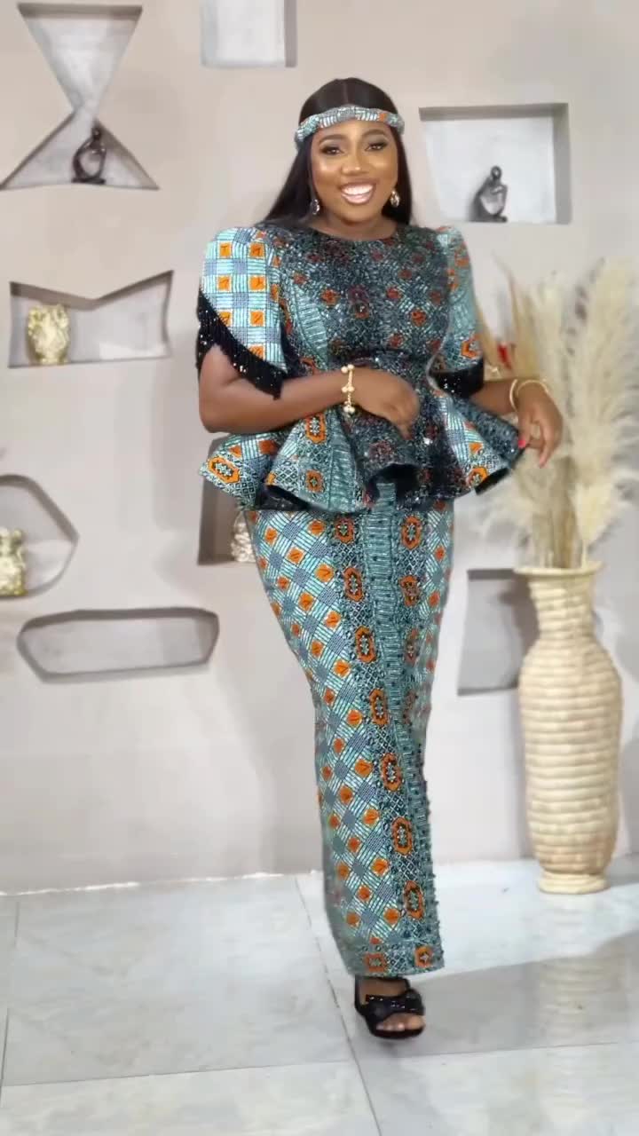 This contains an image of: ANKARA DRESS STYLES