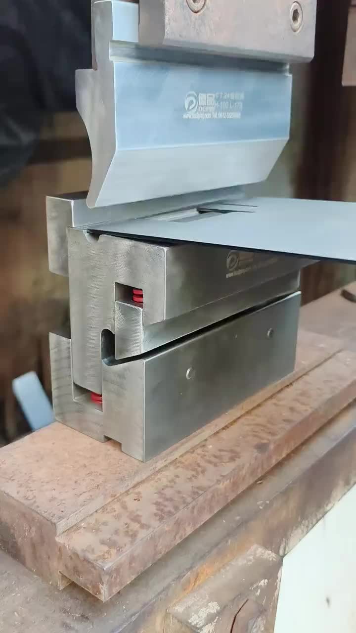 This may contain: a piece of metal being worked on by a machine