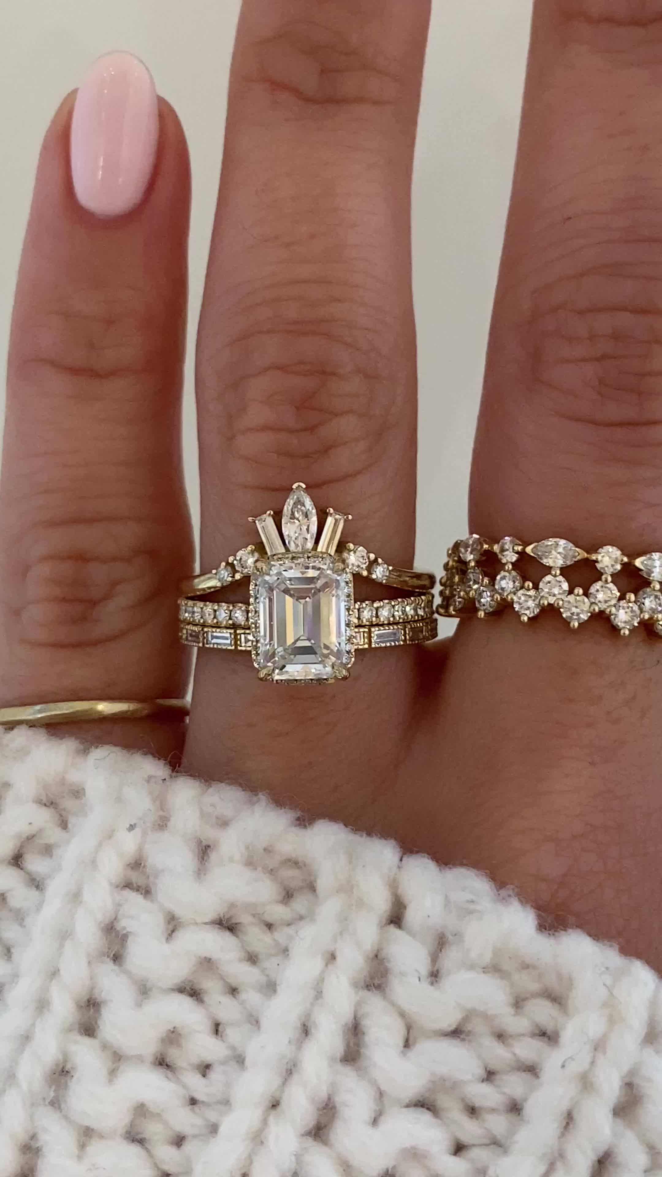 Samanthina features a striking emerald cut diamond sitting atop the band. We then sprinkled some diamonds along the ring's gallery to give it extra sparkle and a peek-a-boo halo. To add to her magnificence she exhibits pave half way down her band. Islet's curved band holds a marquise diamond as the center piece accompanied by two baguette cuts on either side with round cut sparklers finishing off the piece. Iva is the perfect companion that effortlessly stacks to create a harmonious and elegant 