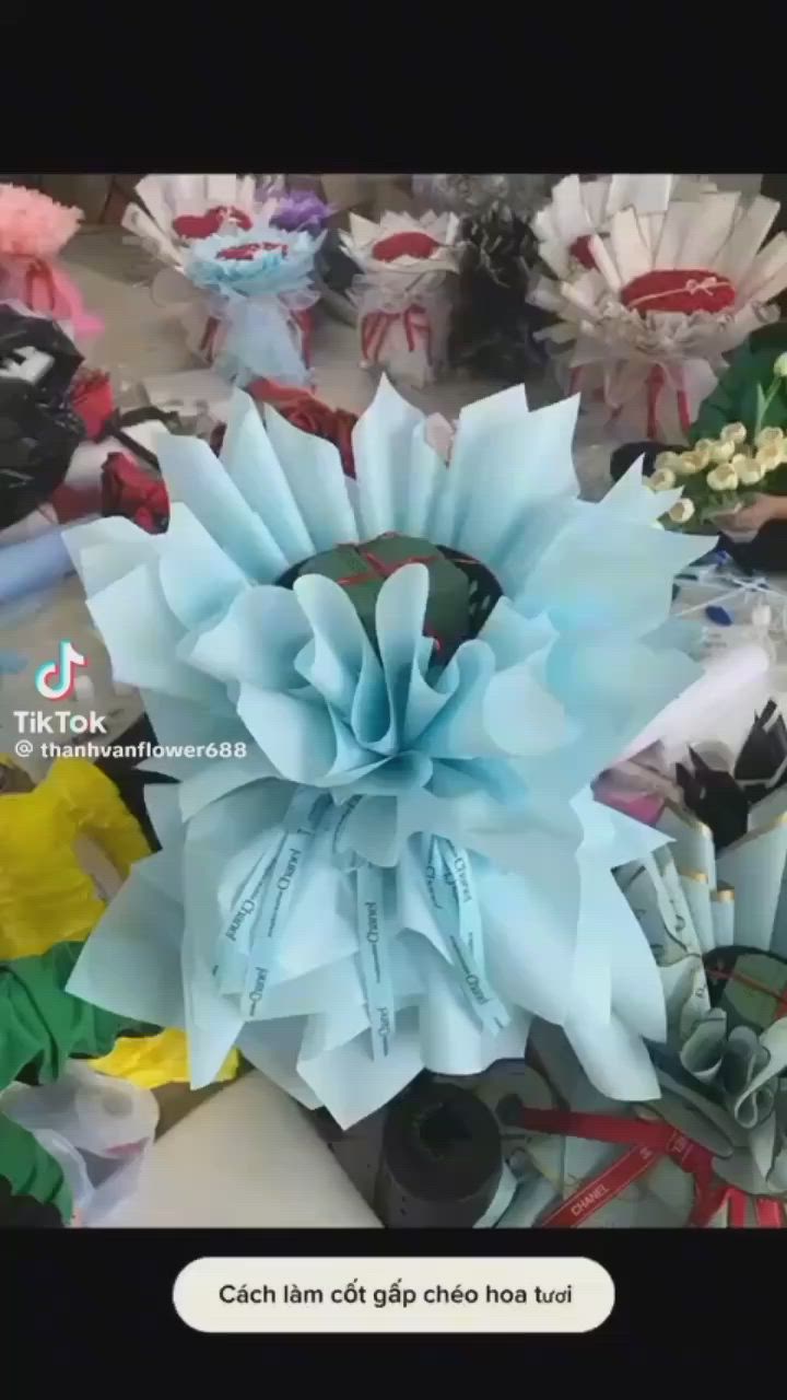 This may contain: there are many different types of paper flowers