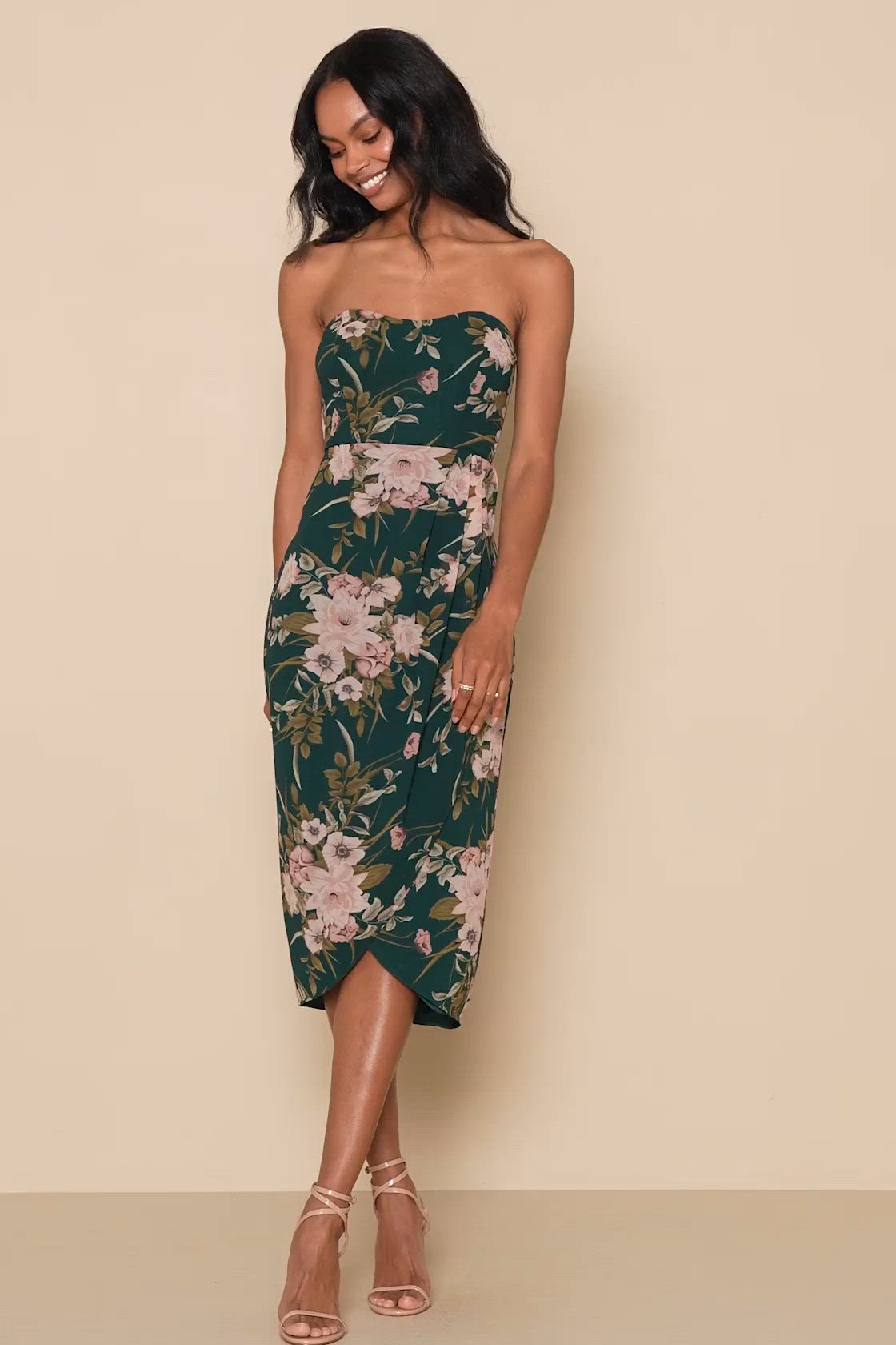 There's no denying that the Lulus Effortless Charm Hunter Green Floral Strapless Tulip Midi Dress has captivated us! This elegant dress has lightweight woven chiffon composition that shapes a princess-seamed, strapless bodice and a sweetheart neckline with hidden no-slip strips. A high, fitted waist tops an overlapping midi skirt that boasts a tulip silhouette. Hidden back zipper/clasp. Fit: This garment fits true to size. Length: Knee to mid-calf length. Size medium measures 35.5" from top to b