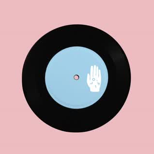 This may contain: a record with a hand on it and a red dot in the middle, against a pink background