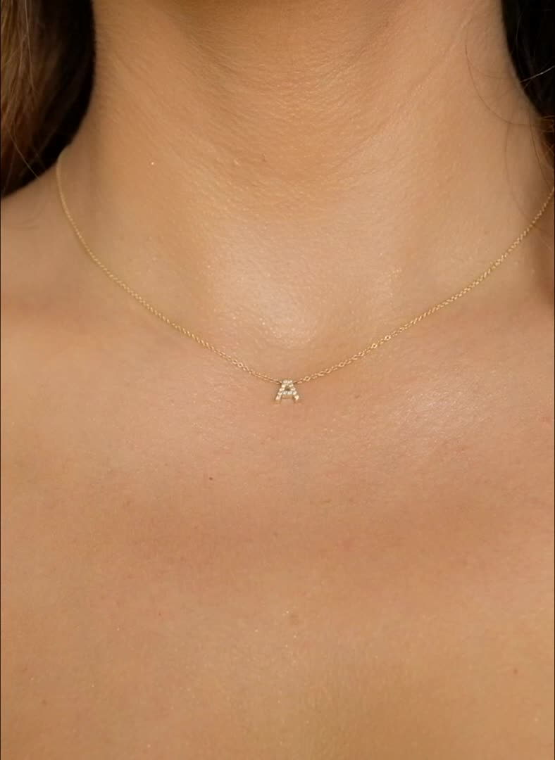 Our 14K Gold Diamond Pave Letter Necklace is handset with approximately 0.05-0.12cts of high quality natural diamonds. This delicate yet bold initial necklace will become your go to daily favorite, never need to take it off! Comes in 3 sizes

Size: Approx. 0.05-0.12 cts
0.25-0.5 mm size variation due to stone setting allocation may apply
High  Quality G-H Color VS2-SI1 Clarity Natural Diamond

14K Solid Gold
Lifetime Guarantee
Made in Los Angeles