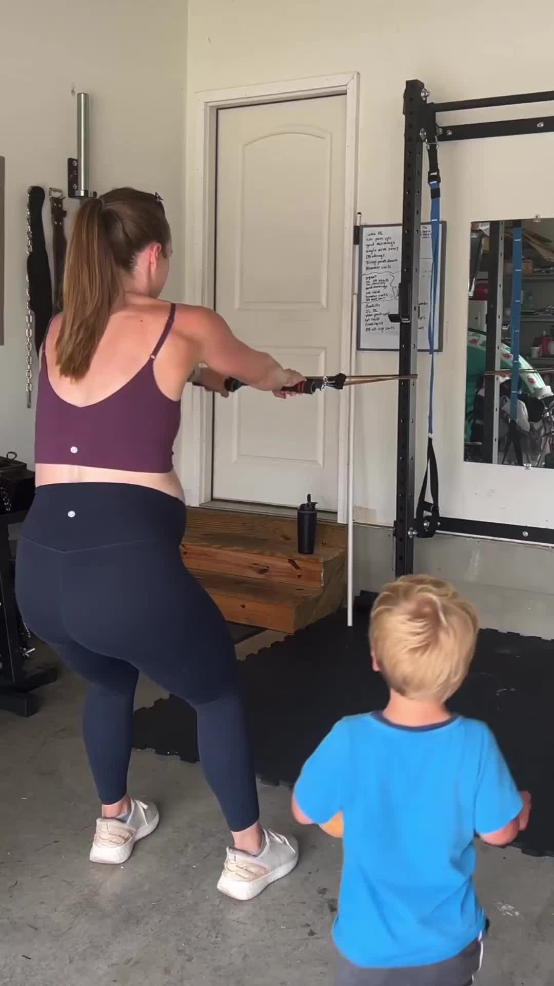 This may contain: a woman is doing squats in front of a mirror with the words bands - only full body workout