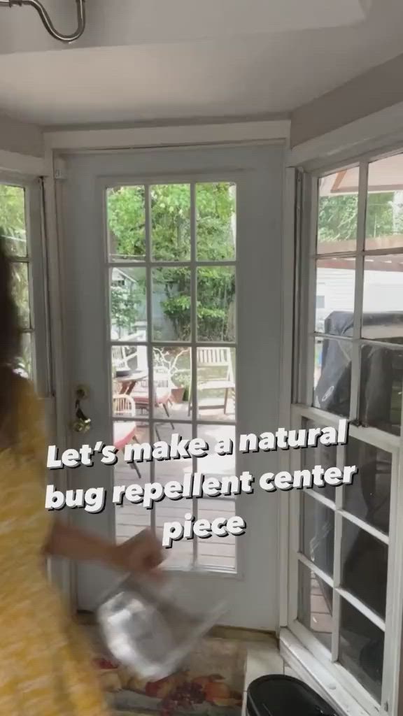 This may contain: a woman is opening the door to her house with an advertisement on it that says let's make natural bug repellent center piece