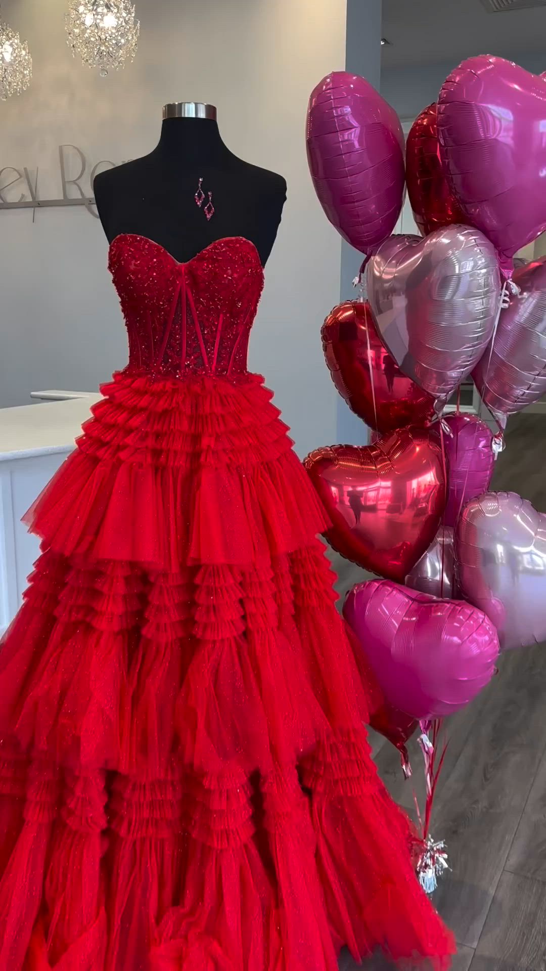 This contains an image of: Red Ruffles Ball Gown