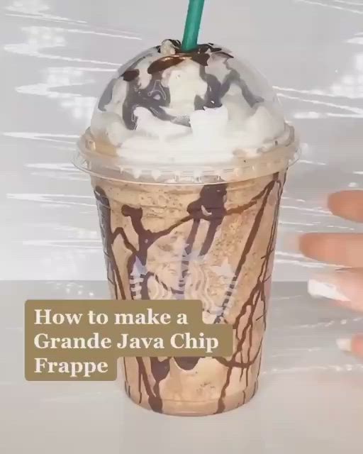 This may contain: an ice cream sundae in a plastic cup with the words how to make a grande lava chip frappe