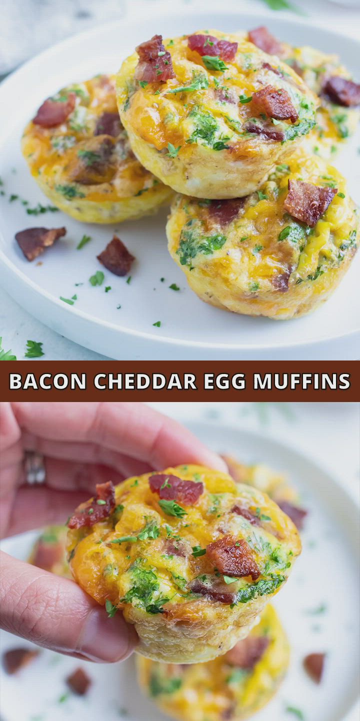 This may contain: bacon cheddar egg muffins on a white plate