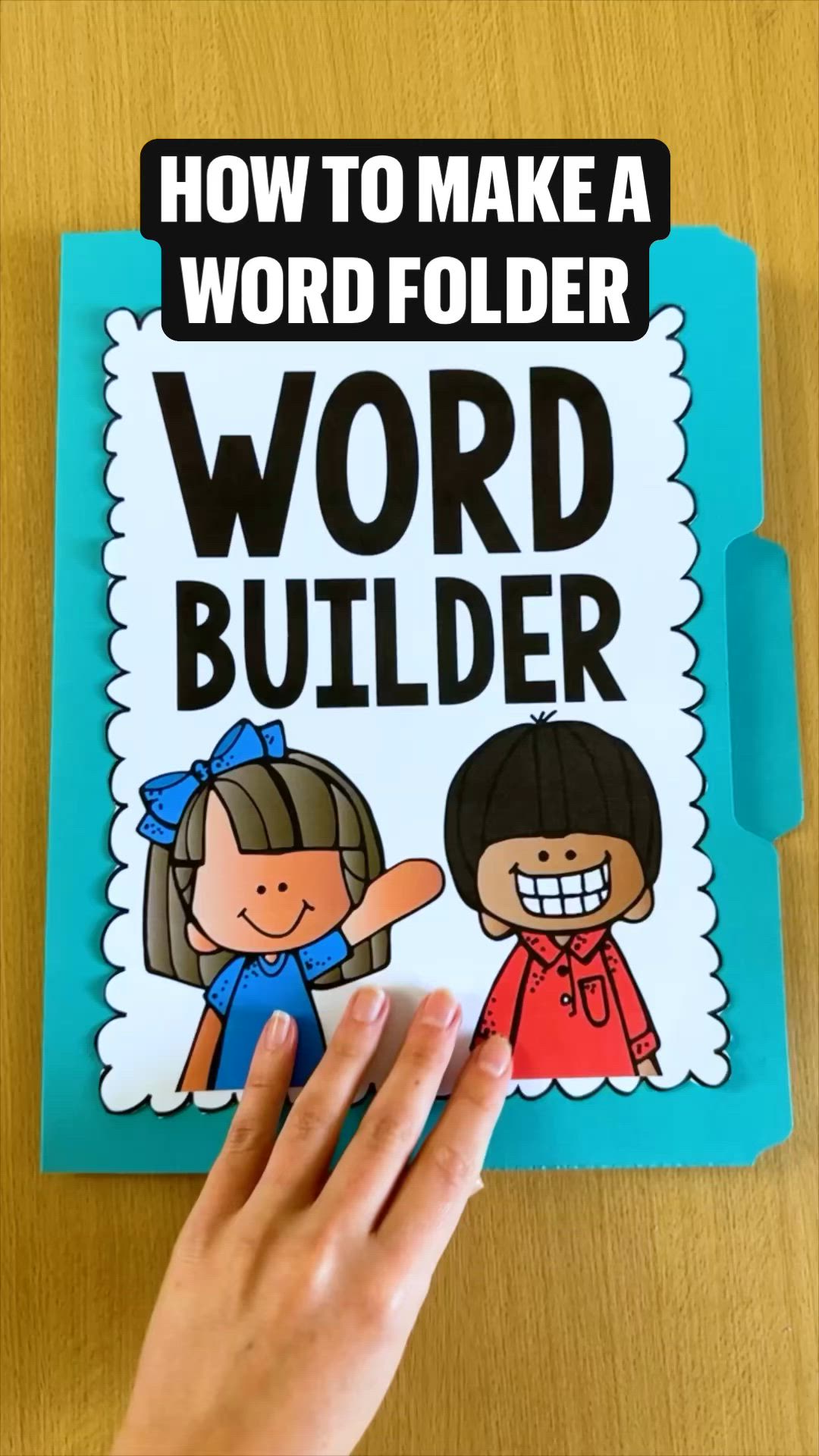 This may contain: a hand holding up a book with the words word builder on it and an image of two