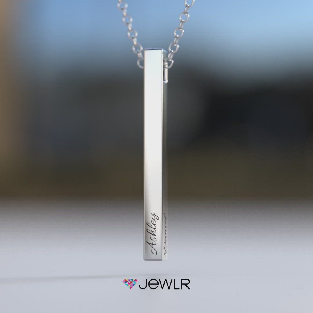 Sleek and trendy, design this unique, personalized bar necklace with up to four engravings. This stunning bar pendant is available in sterling silver or gold and hangs from a delicate, matching chain. Create the perfect personalized jewelry gift for her or a one-of-a-kind Christmas gift for her. #Jewlr #BarNecklace #NameNecklace #ChristmasGift #PersonalizedJewelry