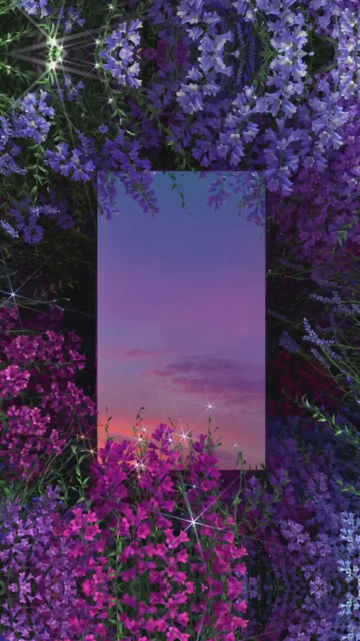 This may contain: purple flowers with the sky in the background