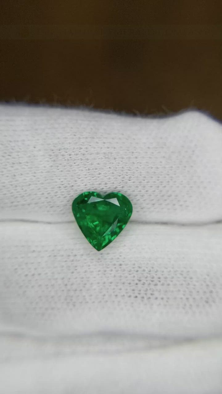 One beautiful transparent 1.58 carat heart shape green emerald with dimensions of 8.19 x 8.47 x 4.75 mm. It has a mixed brilliant cut, and a clarity grade of very slightly included (evaluated at eye level), vivid color intensity, and an excellent polish. The origin of this emerald is Zambia.💚