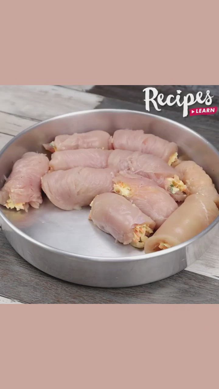 This may contain: raw chicken pieces in a pan ready to be cooked on the stove or used as an appetizer