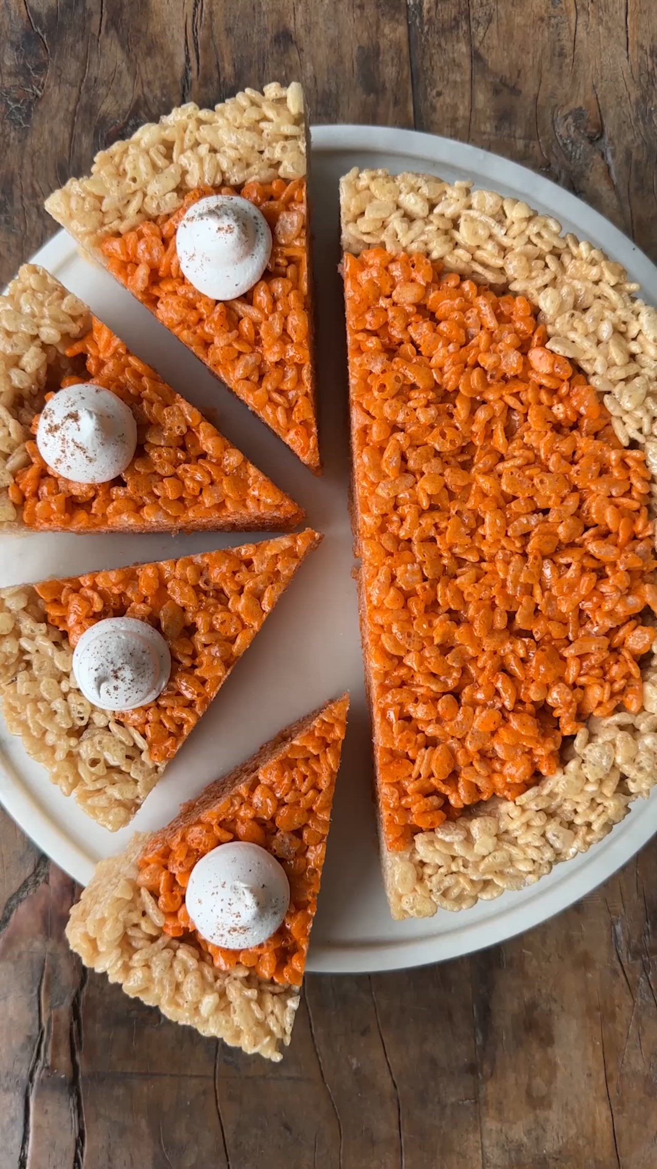 This contains: Step-by-step process for making classic Rice Krispies Treats and pumpkin-spiced Rice Krispies Treats that are formed into a pie shape and topped with dollops of whipped cream.