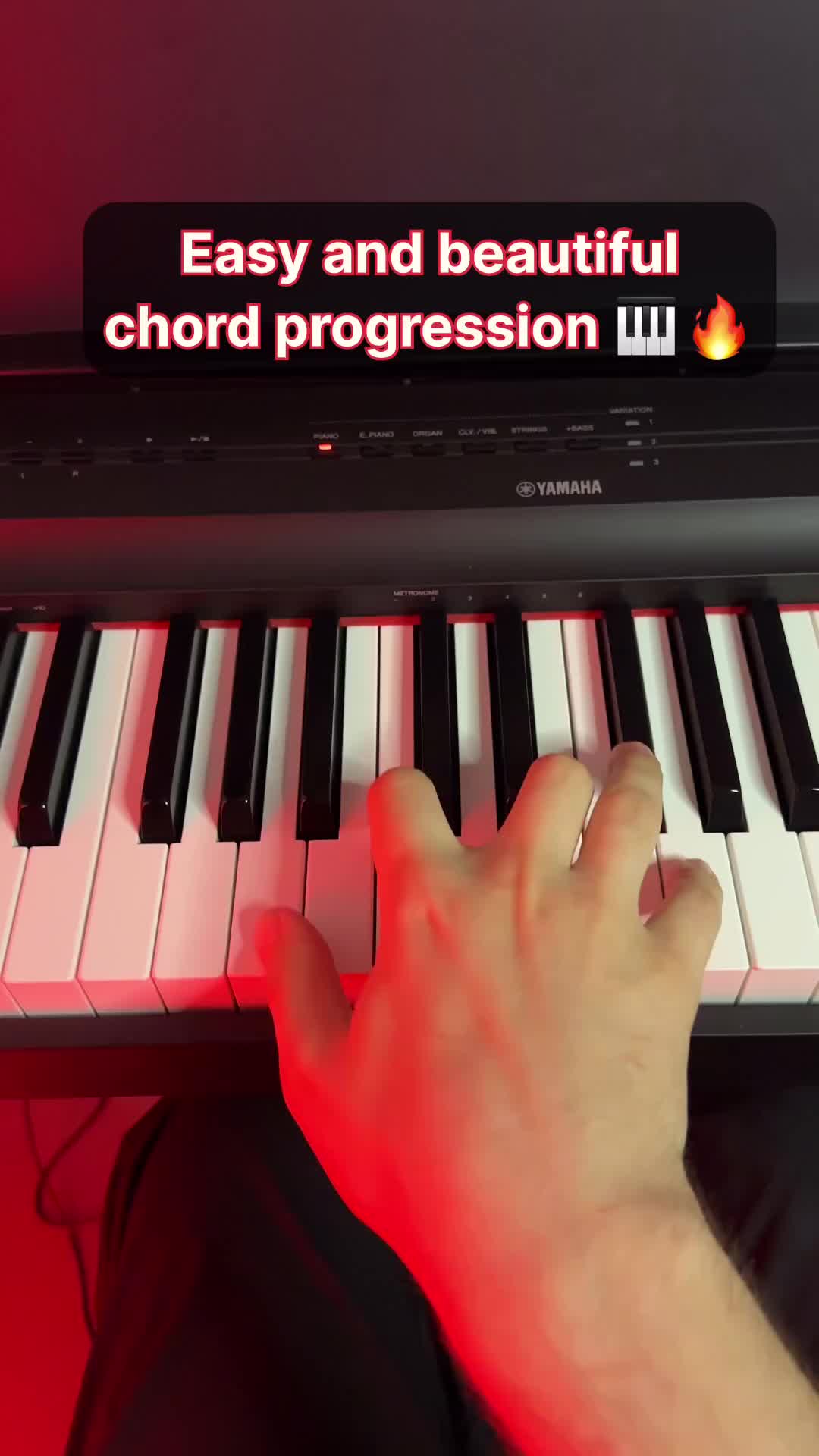 This may contain: someone is playing the piano with their hand and fingers on it, which reads easy and beautiful chords progression w / am7