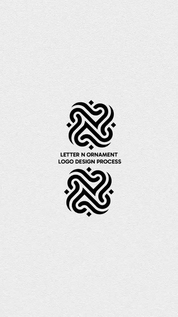 This may contain: the logo for letter n ornament is designed in black and white with an intertwined