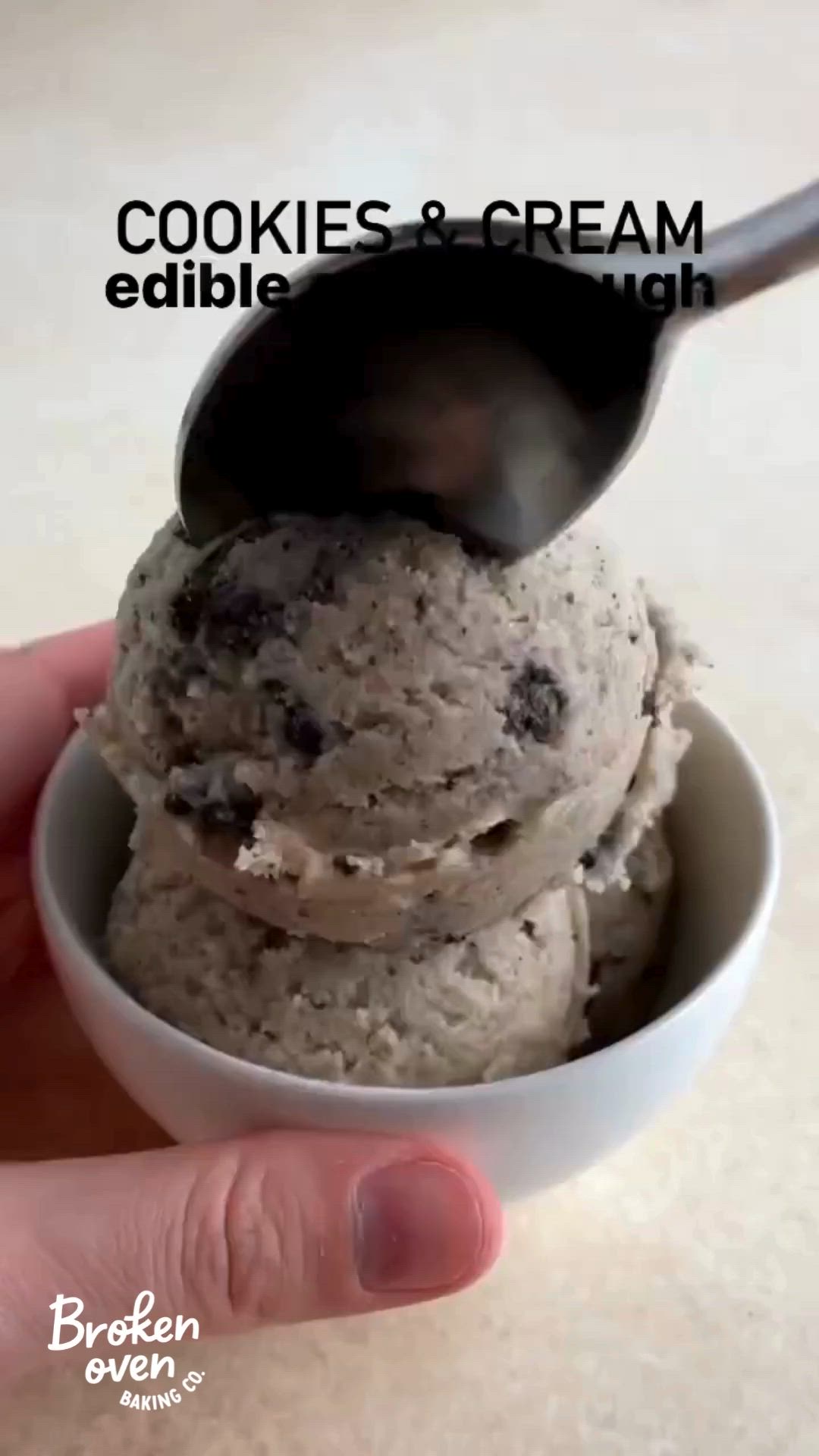 This may contain: two scoops of cookies and cream edible cookie dough