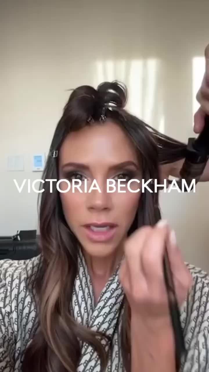 This may contain: victoria beckham is getting her hair done with an electric blow dryer and mascara