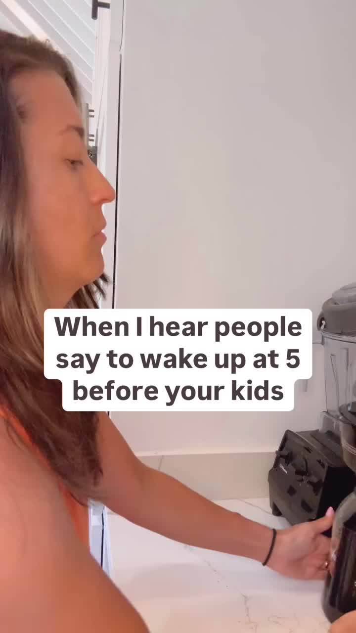 This may contain: a woman pouring something into a blender with the words when i hear people say to wake up at 5 before your kids