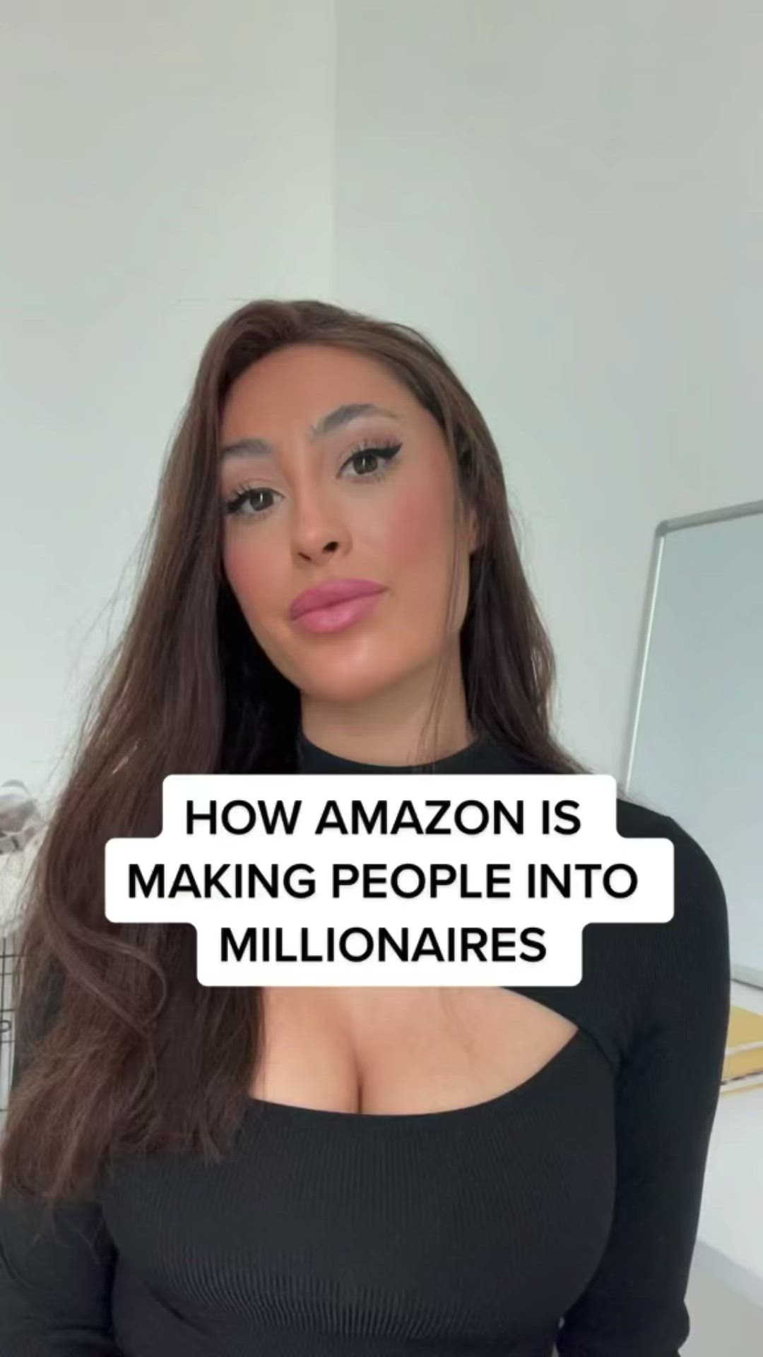 This may contain: a woman with long brown hair wearing a black top and text that reads, how amazon is making people into millionaires