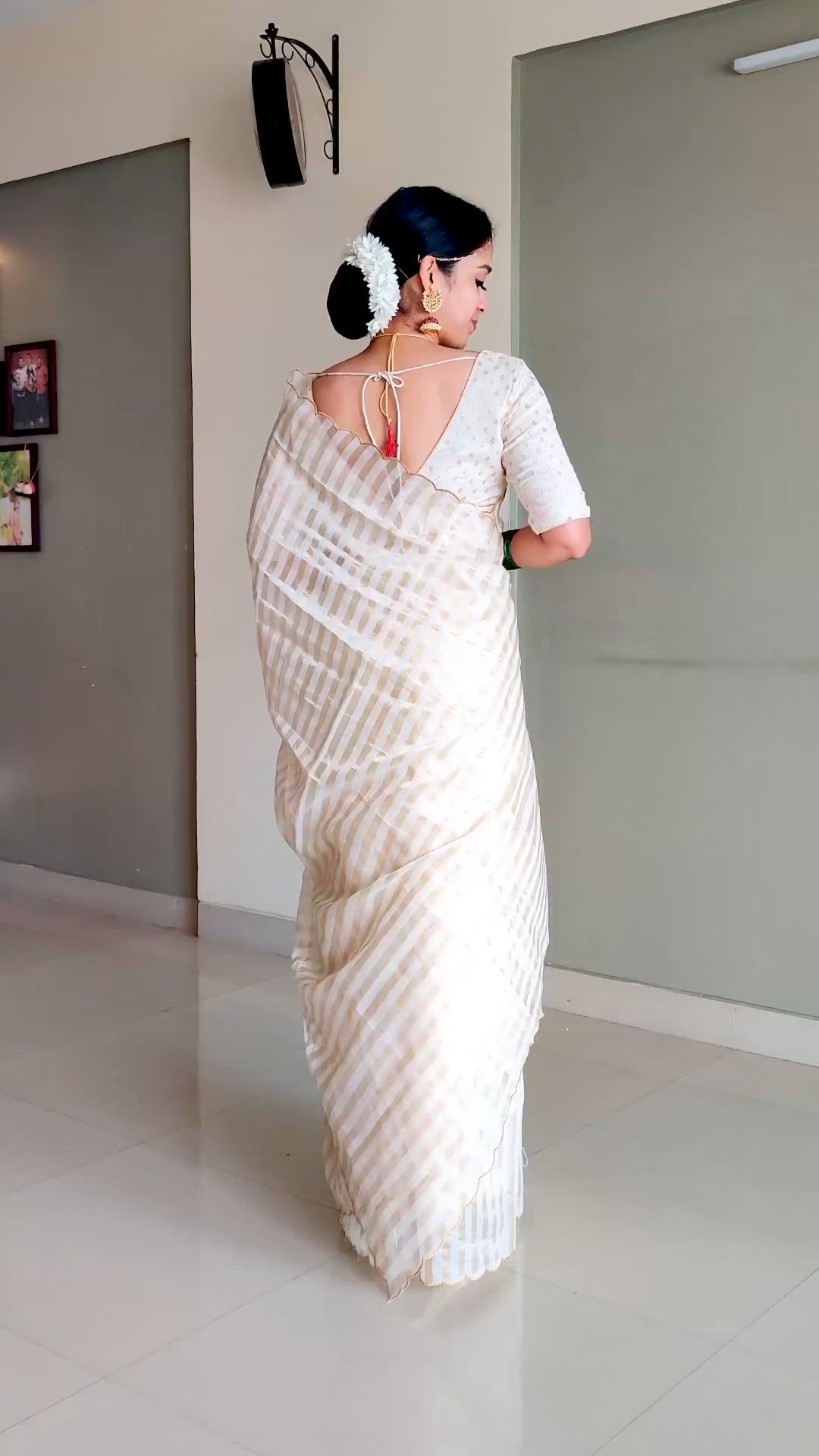 This contains an image of: kerla saree draping