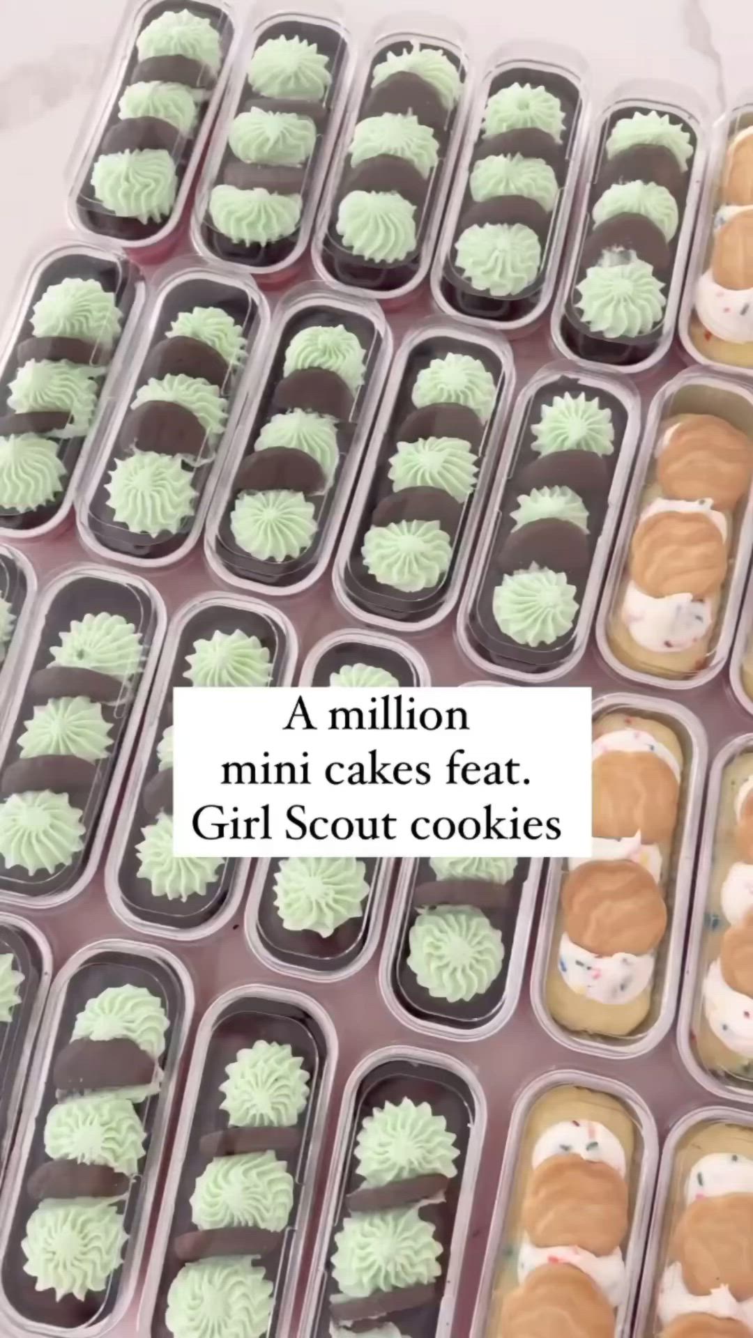 This may contain: there are many mini cakes in the trays with words above them that read, a million mini cakes feat girl scout cookies