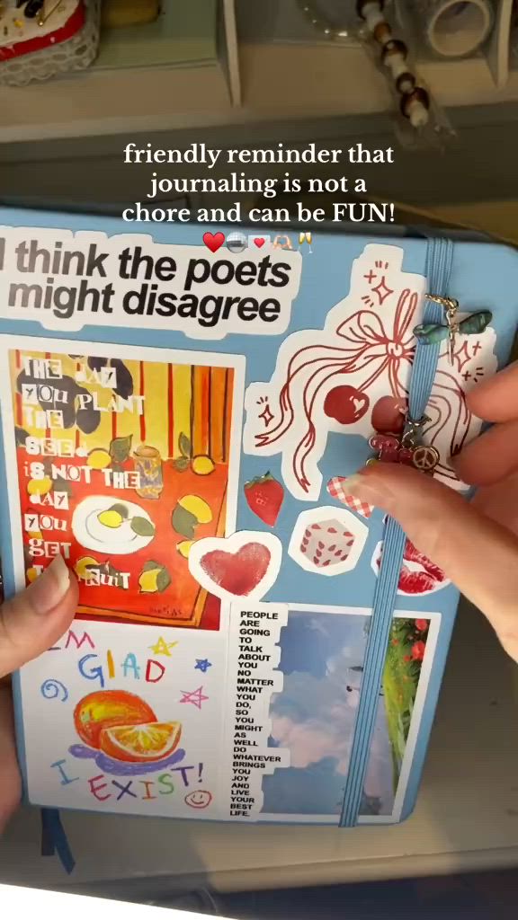 This may contain: a person is cutting out stickers on a piece of paper