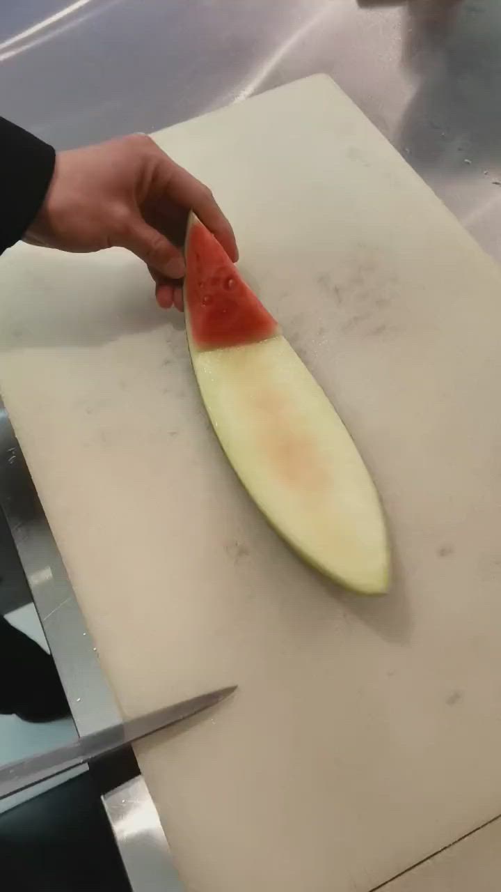 This contains: Watermelon carve - plate garnishing idea