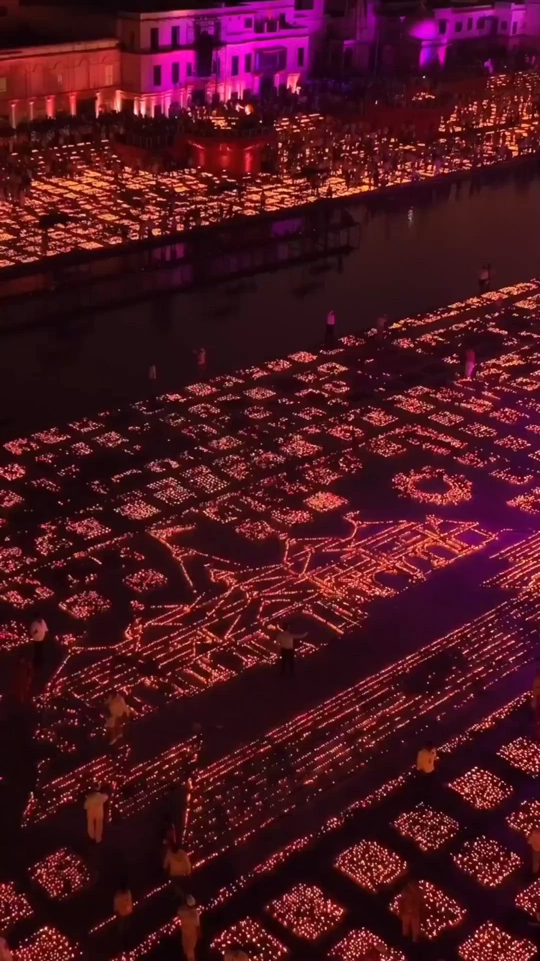 This may contain: an aerial view of many rows of christmas lights in the shape of snowflakes