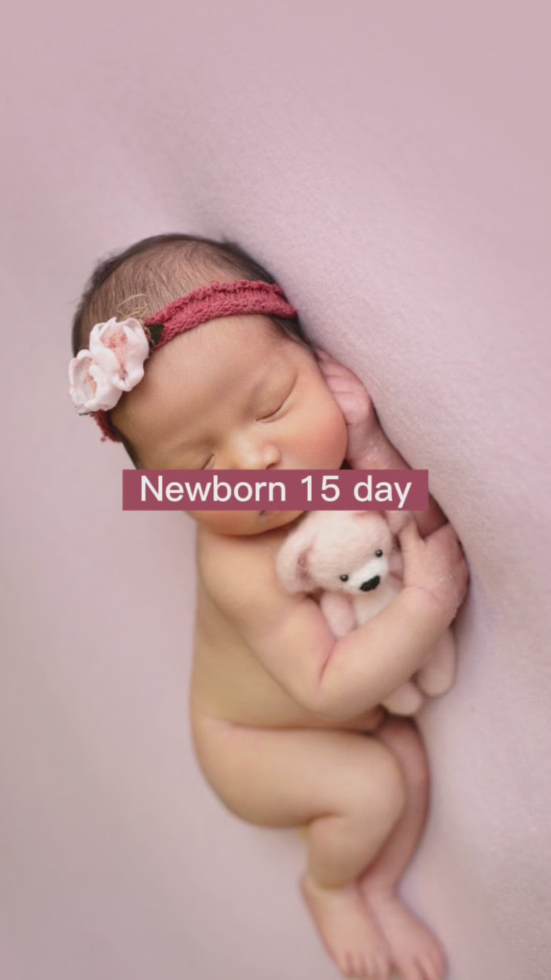 This may contain: newborn baby girl sleeping with her teddy bear