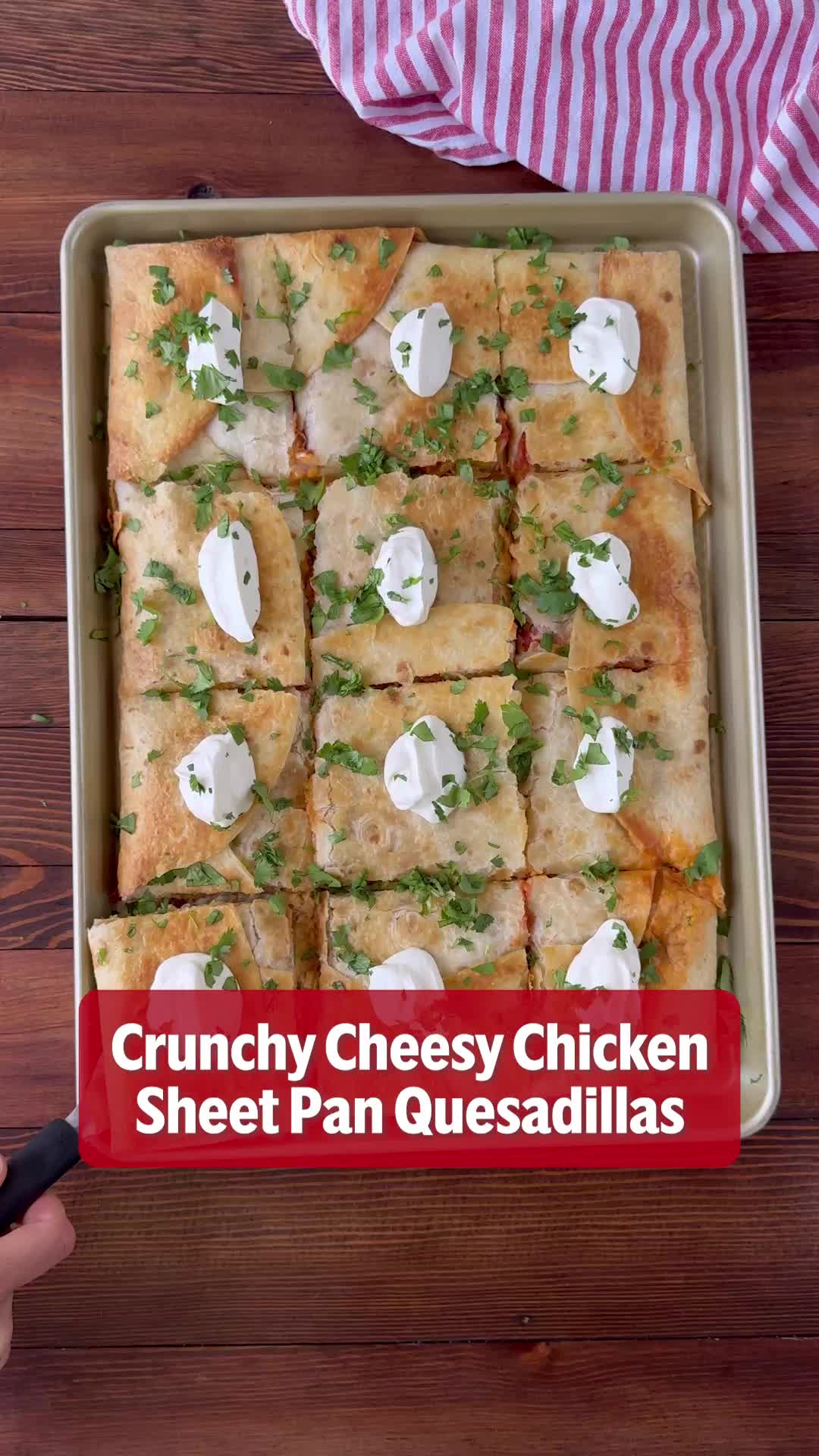 This may contain: a pan filled with chicken and cheese quesadillas on top of a wooden table