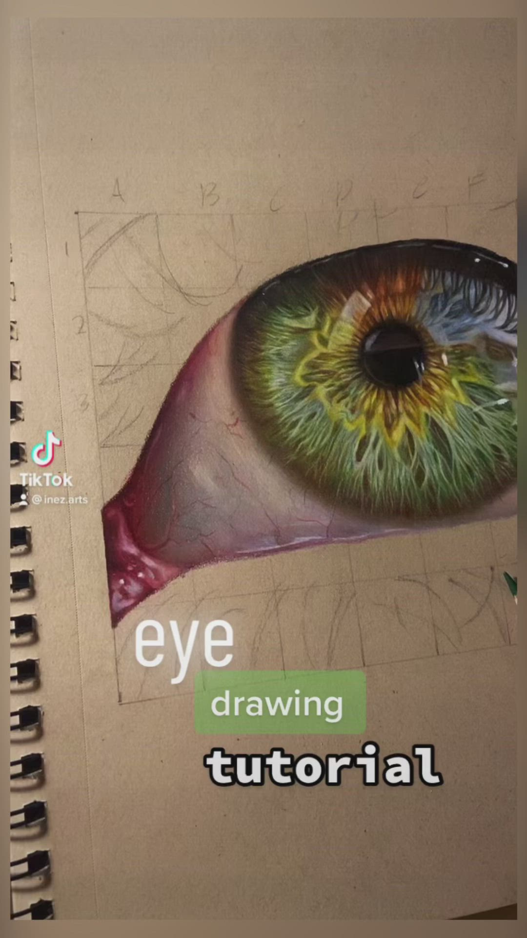 This may contain: an eye drawing with colored pencils on paper