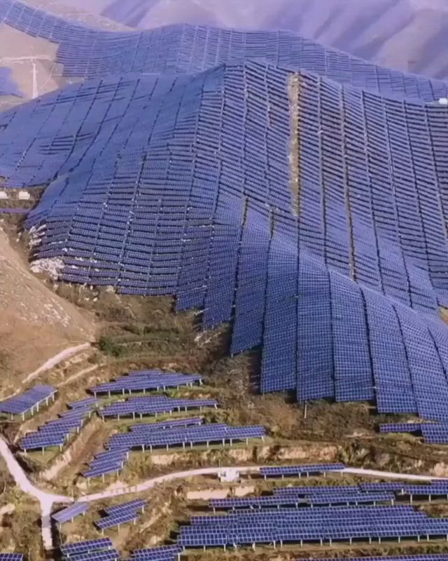 This may contain: an aerial view of solar panels in fields with text overlay that reads, solar panels in fields