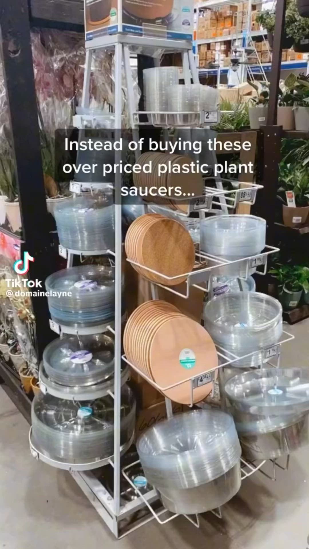 This may contain: pots and pans are stacked up on a rack in a store with the words instead of buying these over priced plastic plant saucers