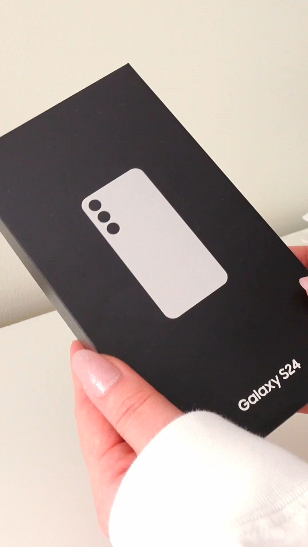 This contains: cute aesthetic unboxing of the Samsung Galaxy s24 in marble Grey or gray. super relaxing unboxing.