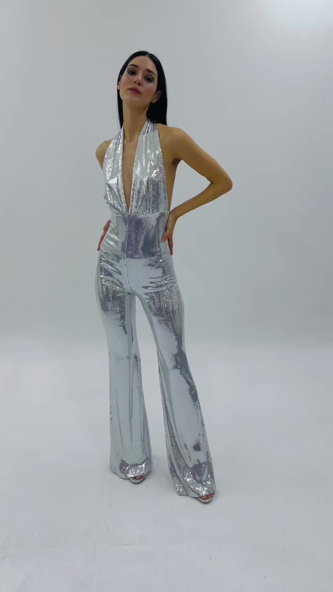 This contains: Silver Jumpsuit,  party outfit, 70s Style Jumpsuit,  80s Jumpsuit,  Halloween Costume, Metallic Dress, Halloween Unique Costume, Silver Dress, Barbi Dress, Birthday Gown, Metallic Party Outfit, 80s Disco Dress, Halloween Costume,  Burning Man Outfit, studio54 outfit, stage costume, Halloween party, stage costume, dance jumpsuit, Sequin dress, evening dress