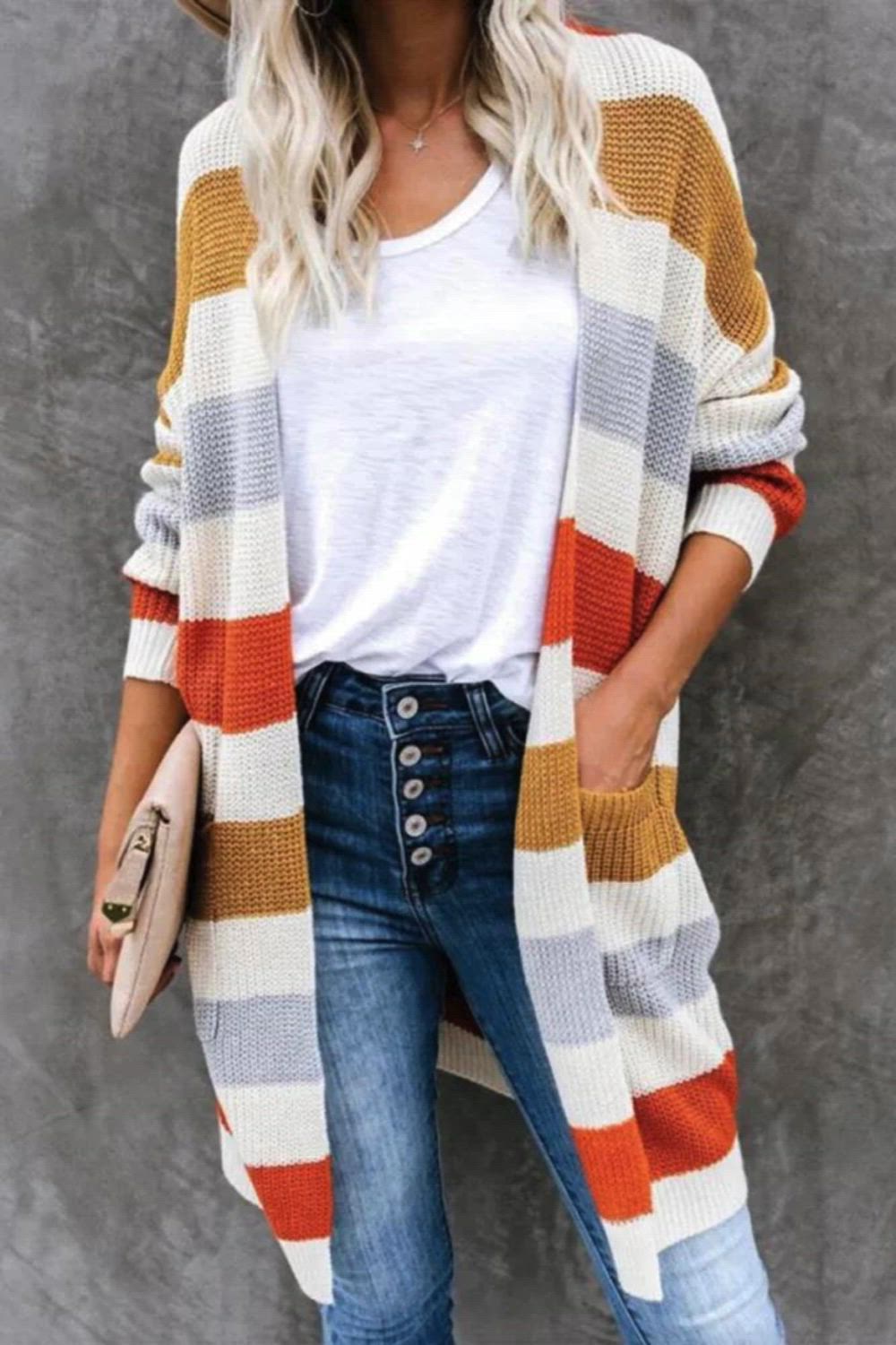 Introducing our Multicolor Striped Knitted Cardigan – a vibrant blend of hues to elevate your winter style. The unique striped pattern adds a playful touch, while the knitted fabric provides warmth and comfort. Versatile and chic, this cardigan is perfect for layering and creating stylish ensembles. Stay cozy and on-trend with this fashion-forward addition to your wardrobe.