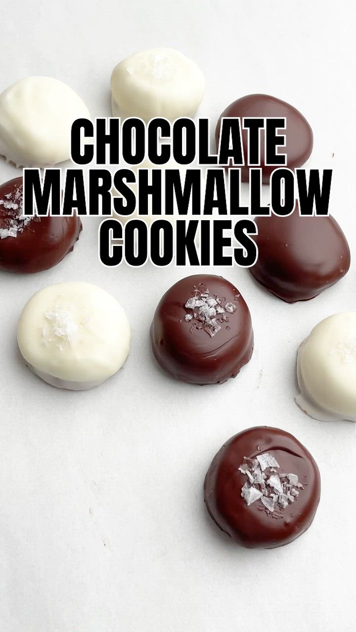 This contains: video demonstrating how to make chocolate covered marshmallow cookies