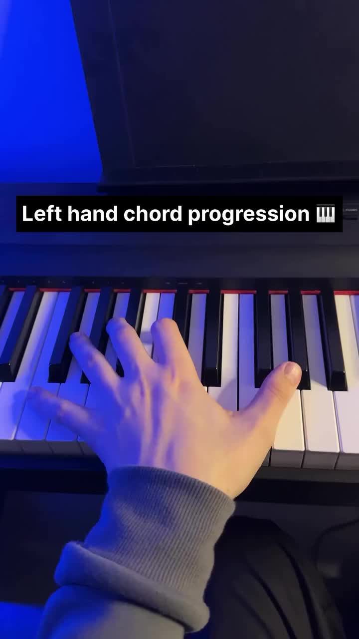 This may contain: a person is playing the piano with their hand on it and texting that reads, left hand choir progression w