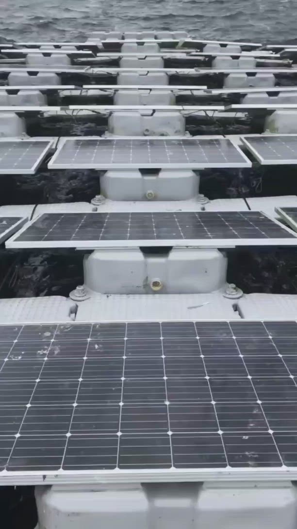 This may contain: rows of solar panels in the water