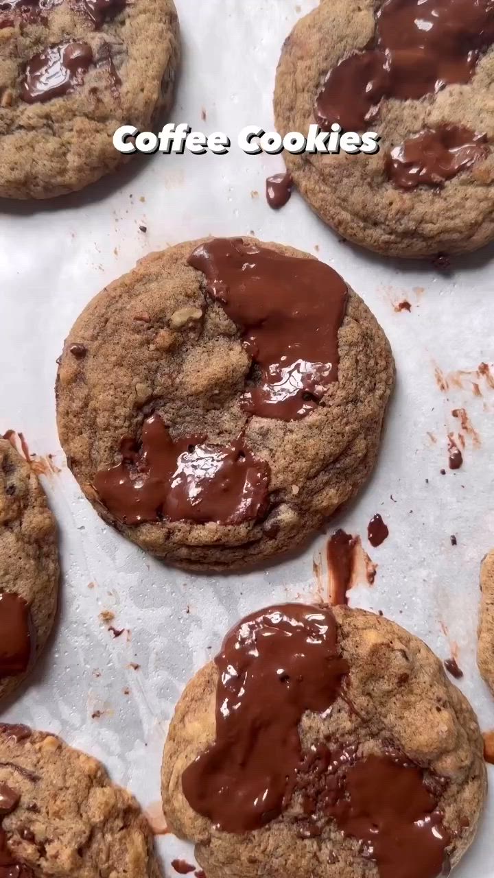 This may contain: chocolate chip cookies with melted chocolate on top