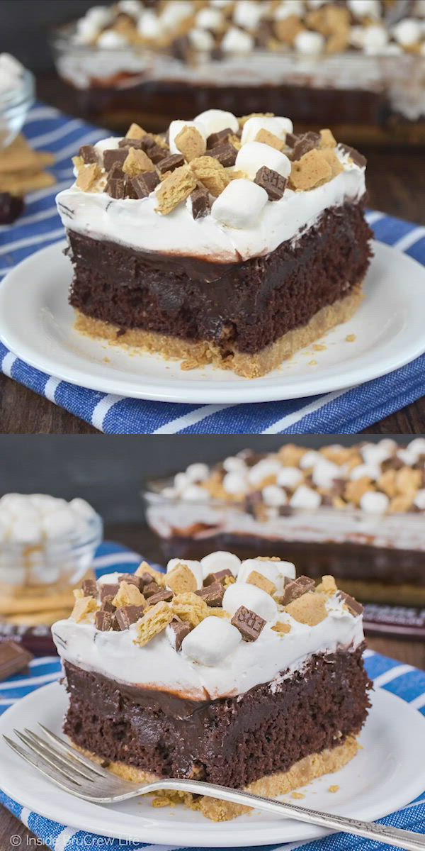 This may contain: a slice of chocolate cake with marshmallows on top