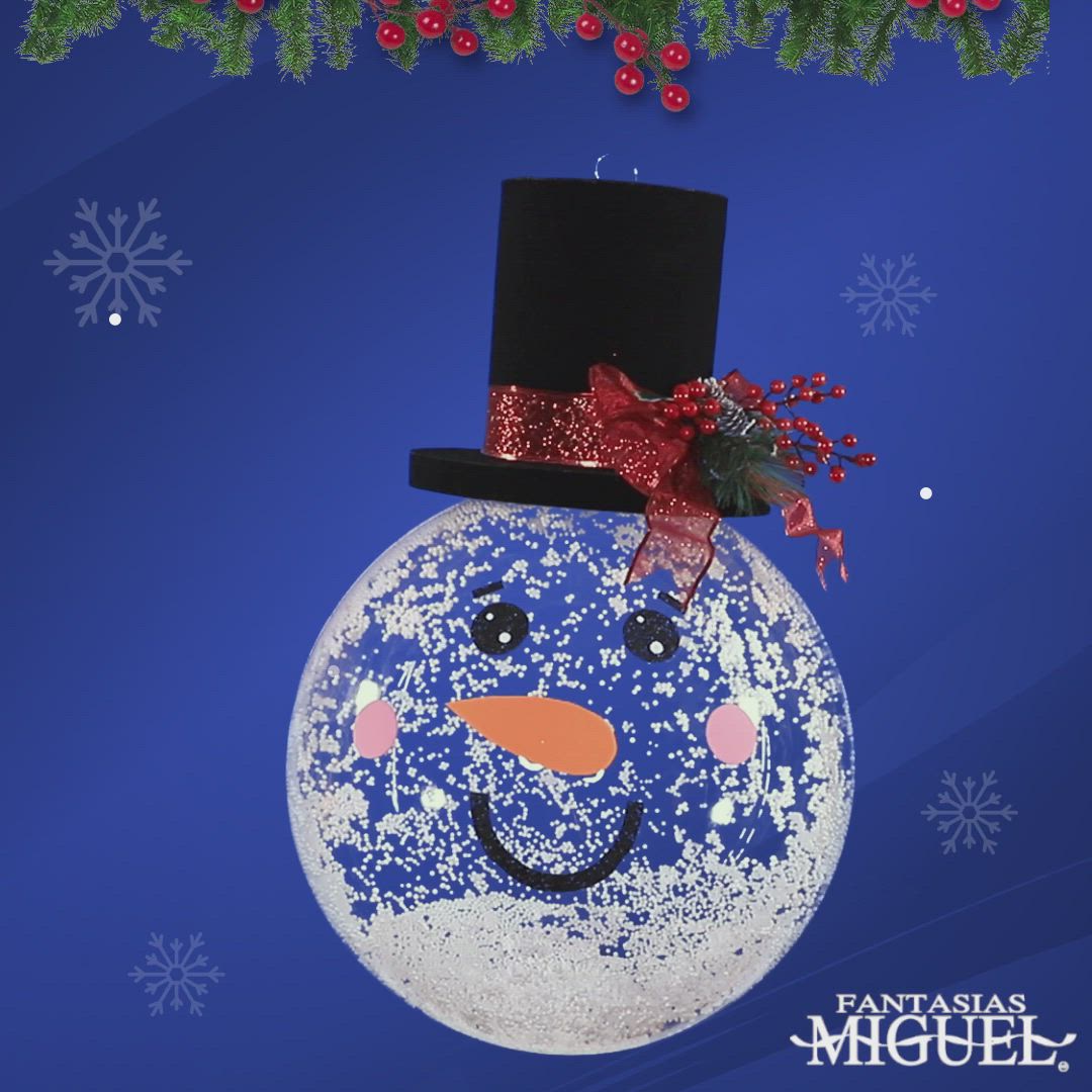 This may contain: a snowman ornament with a top hat on it