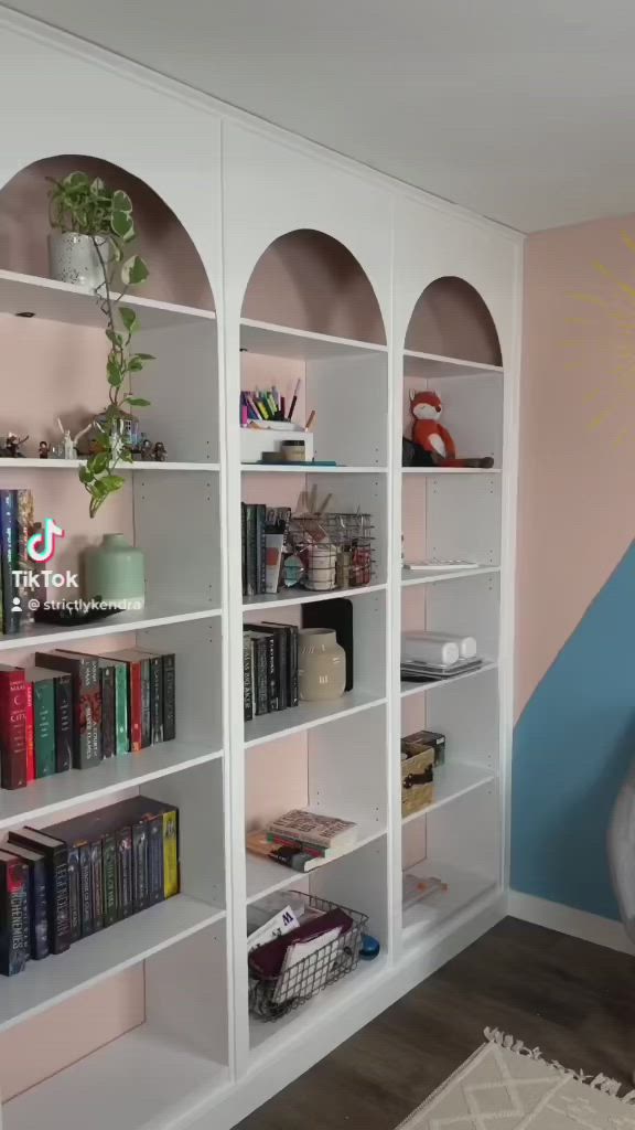 This contains: DIY Arched bookshelves for a home office