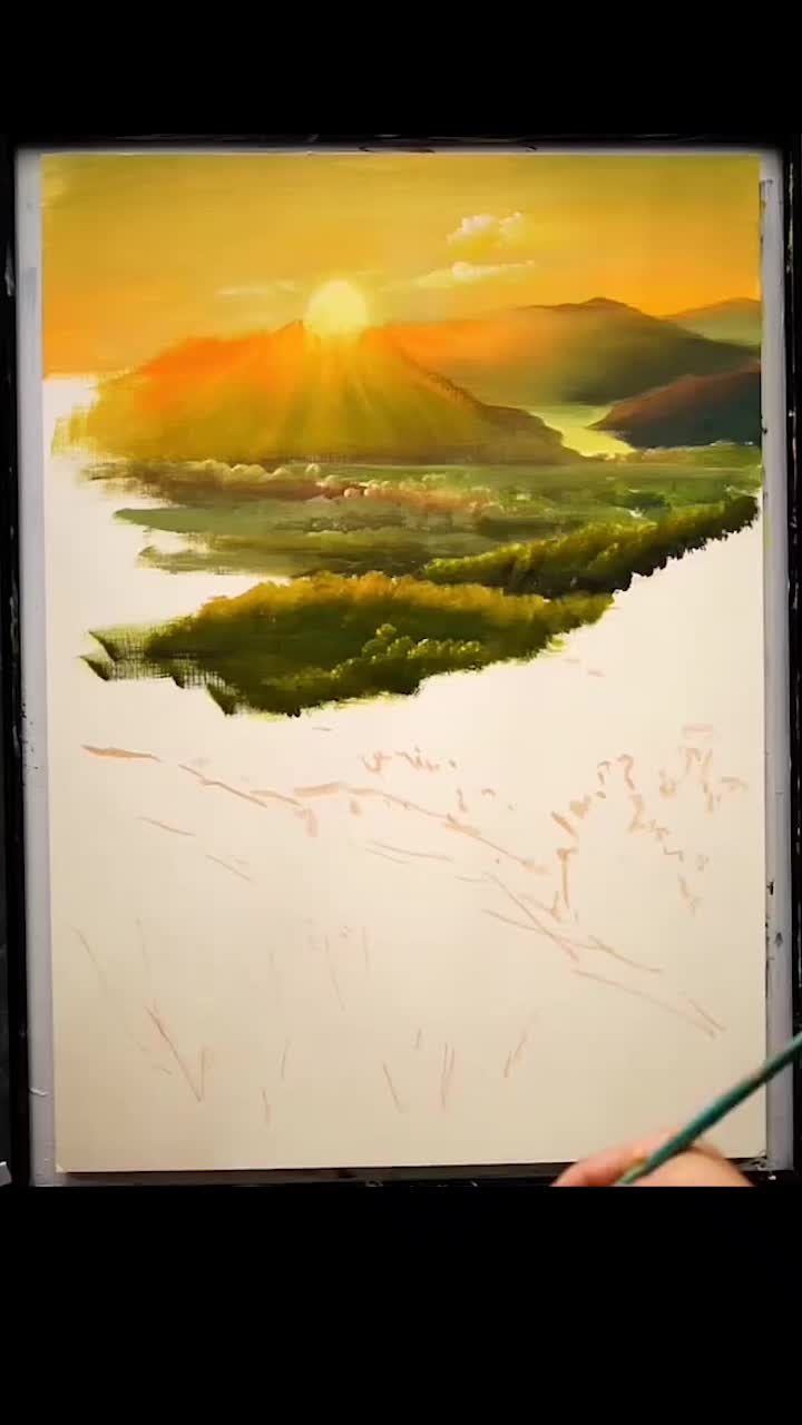 This may contain: a person holding a paintbrush in front of a painting with mountains and trees on it