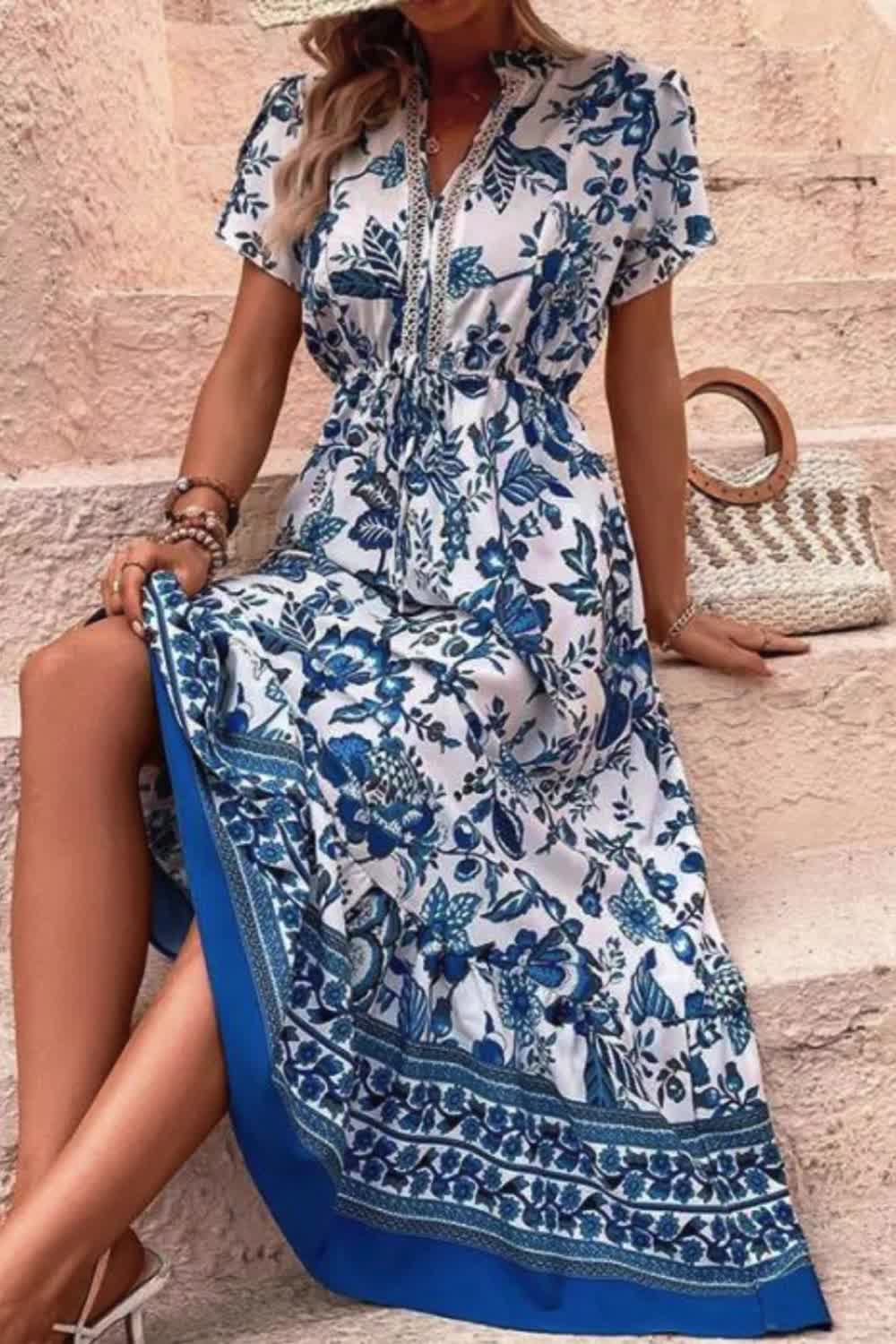 "Elevate your summer style with this Women's Floral Maxi Dress. With its flattering V-neck and short sleeves, it's perfect for beach holidays or casual outings. Embrace the effortless charm and comfort of this dress, ideal for soaking up the sun in style."