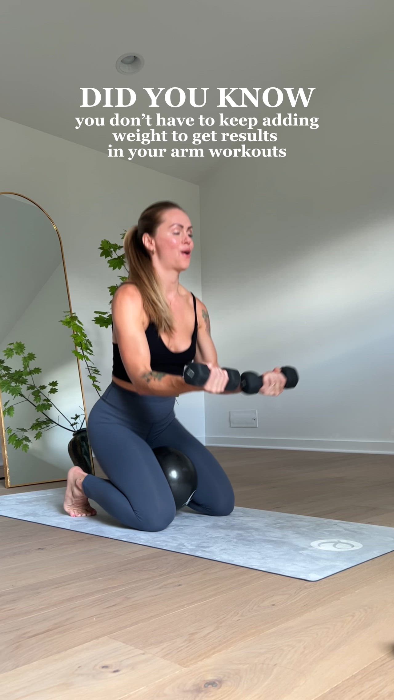 This may contain: a woman is doing yoga with an exercise ball