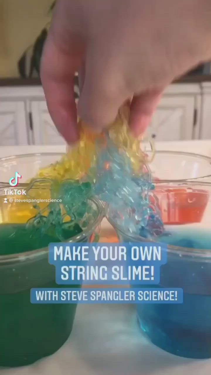 This may contain: someone is pouring colored liquid into small bowls on a table with the words make your own string slime