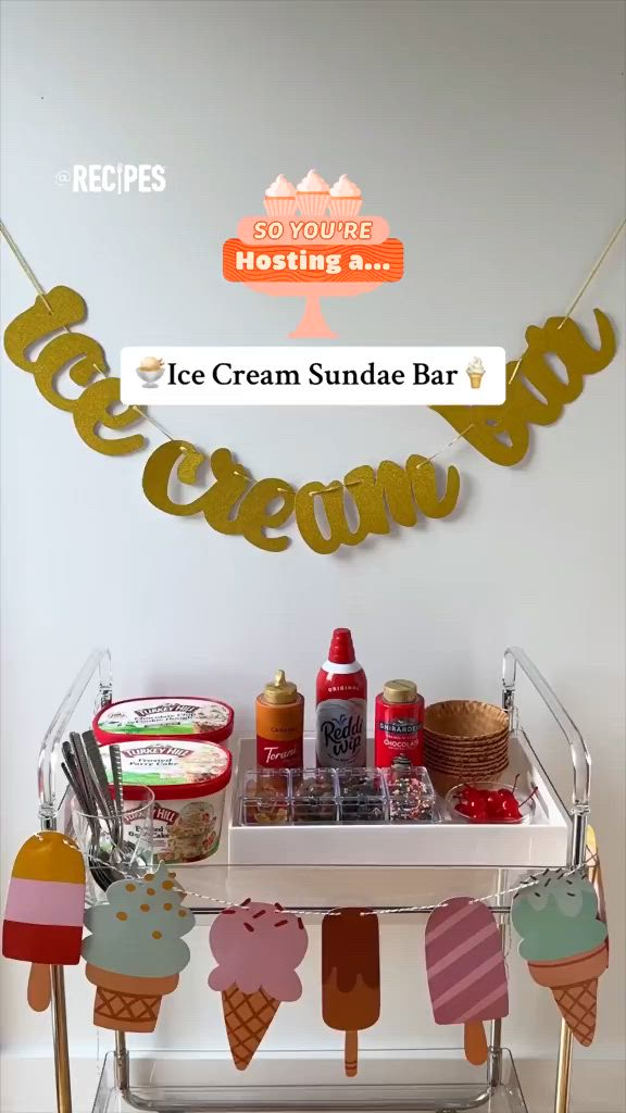 This may contain: an ice cream sundae bar is decorated with gold letters